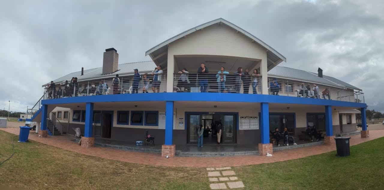 Supporters on the balcony of the De Beers AFC clubhouse